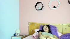 Amateur beauty in lingerie masturbates on webcam