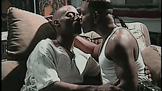 Two black gays share hot kisses and have hardcore anal sex on the couch
